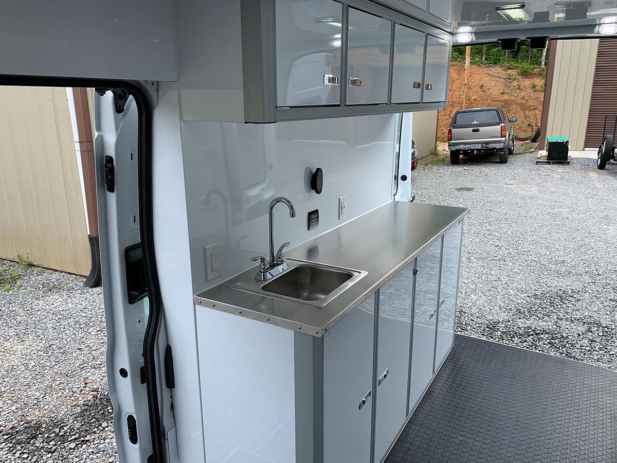An image of a small kitchen area in a command unit