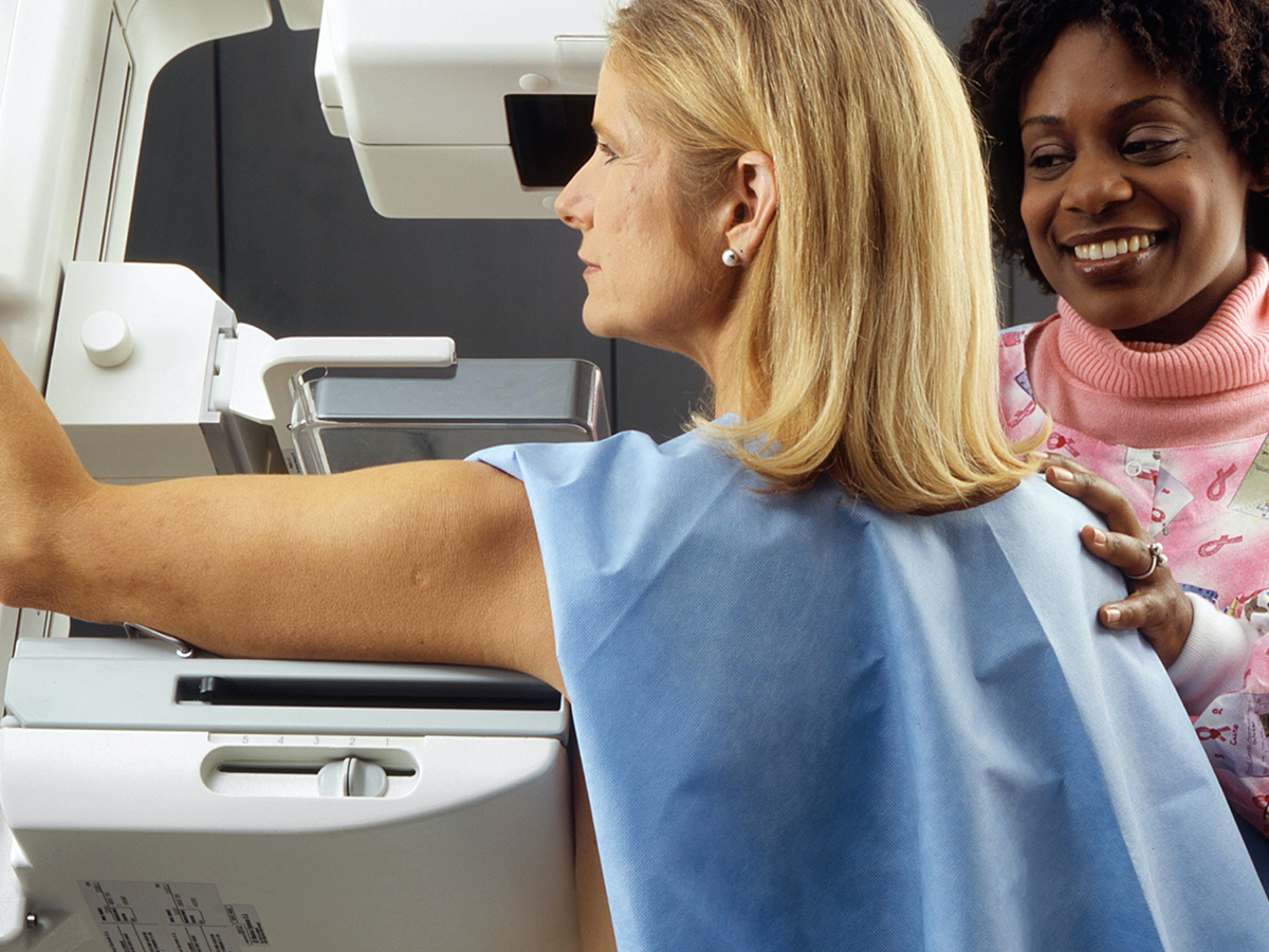 A woman getting a mammogram.
