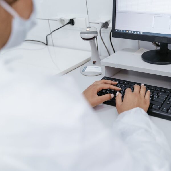 medical person using computer
