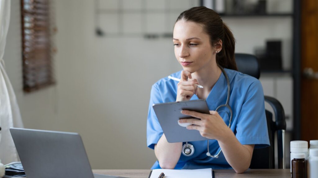 doctor looking looking at computer