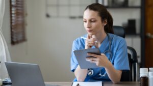 doctor looking looking at computer