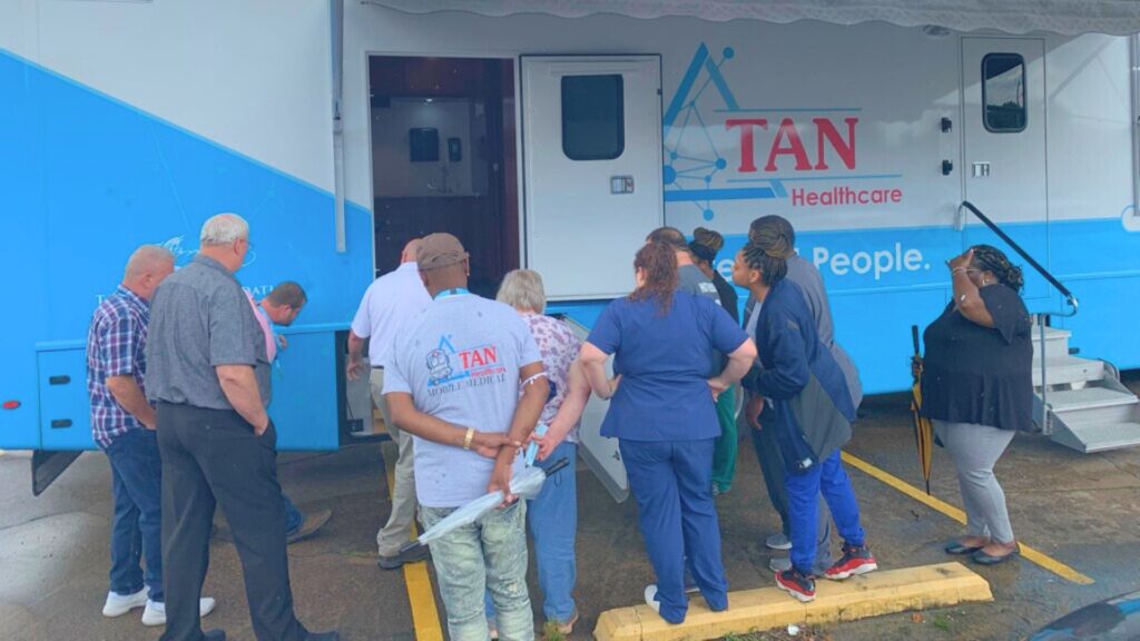 people gathered at medical vehicle
