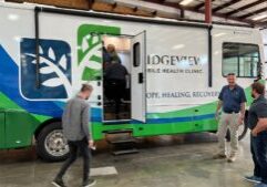 People walking into their new mobile medical unit